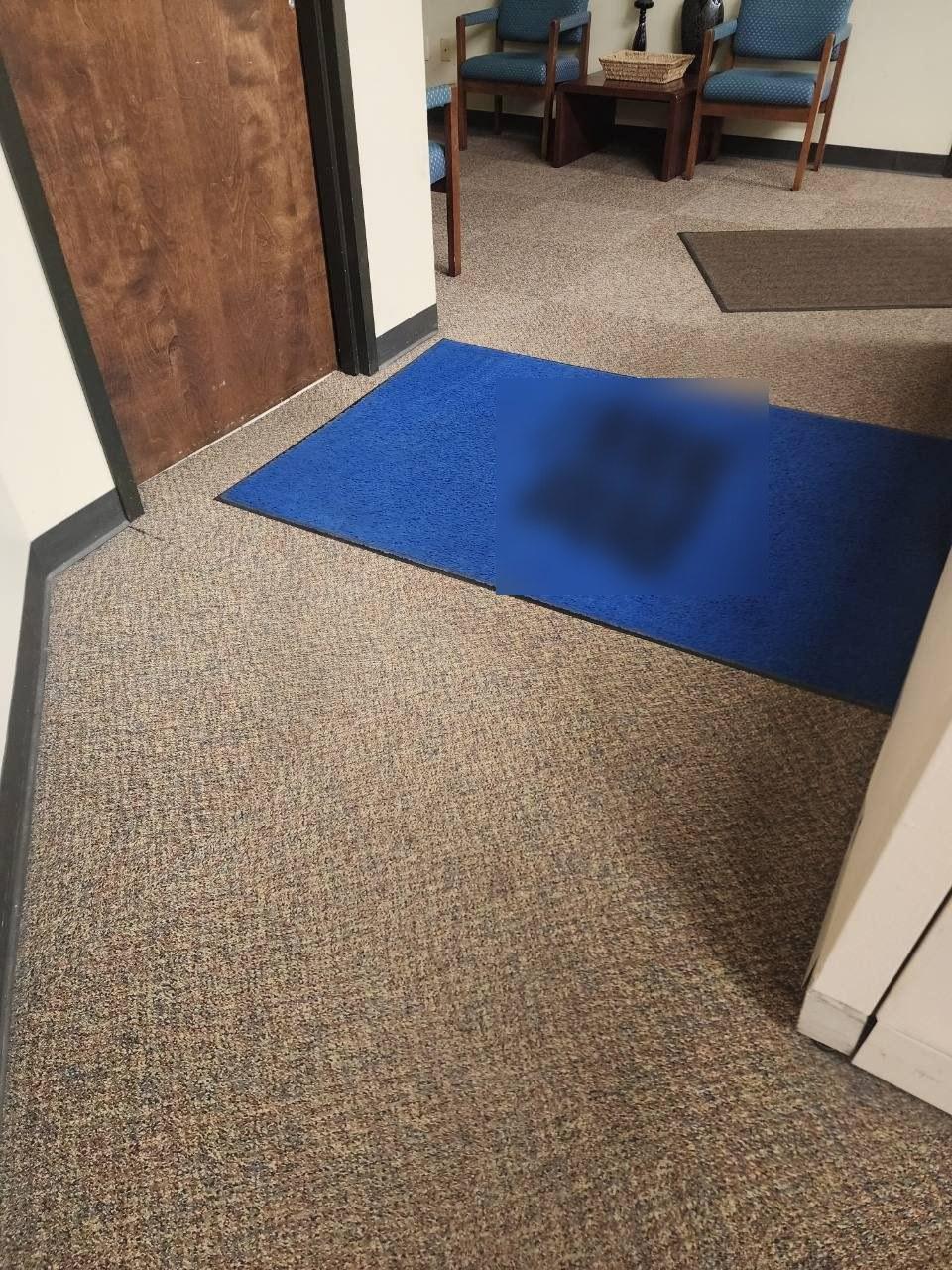 Office entrance and waiting area after vacuuming