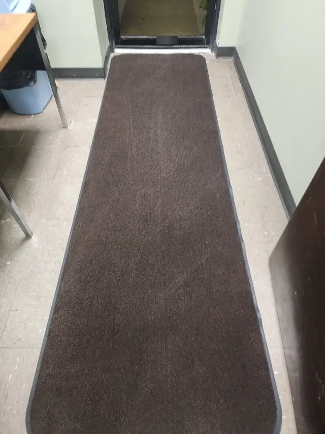 Side entrance vestibule in an Indianapolis commercial facility, after cleaning