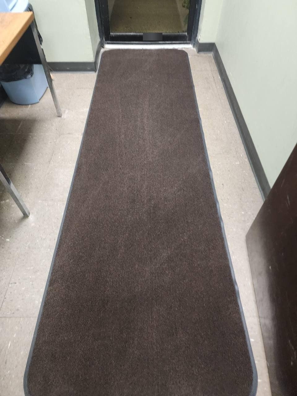 Entrance vestibule runner after vacuuming