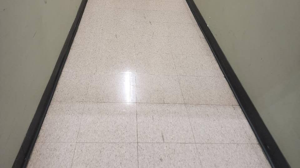 Tile hallway after nightly janitorial service