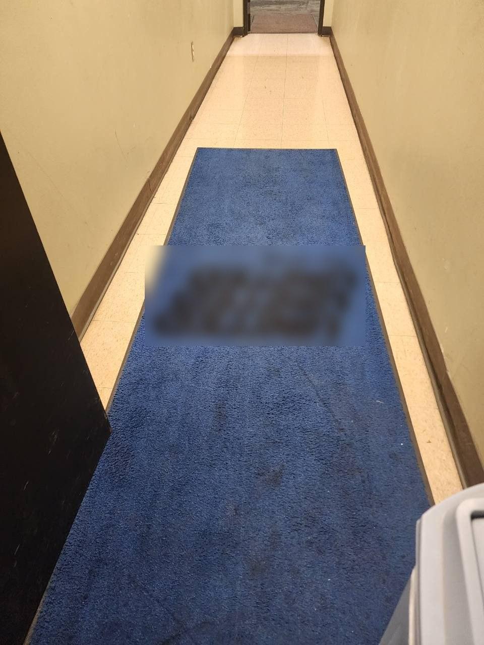 Distribution center hallway before cleaning