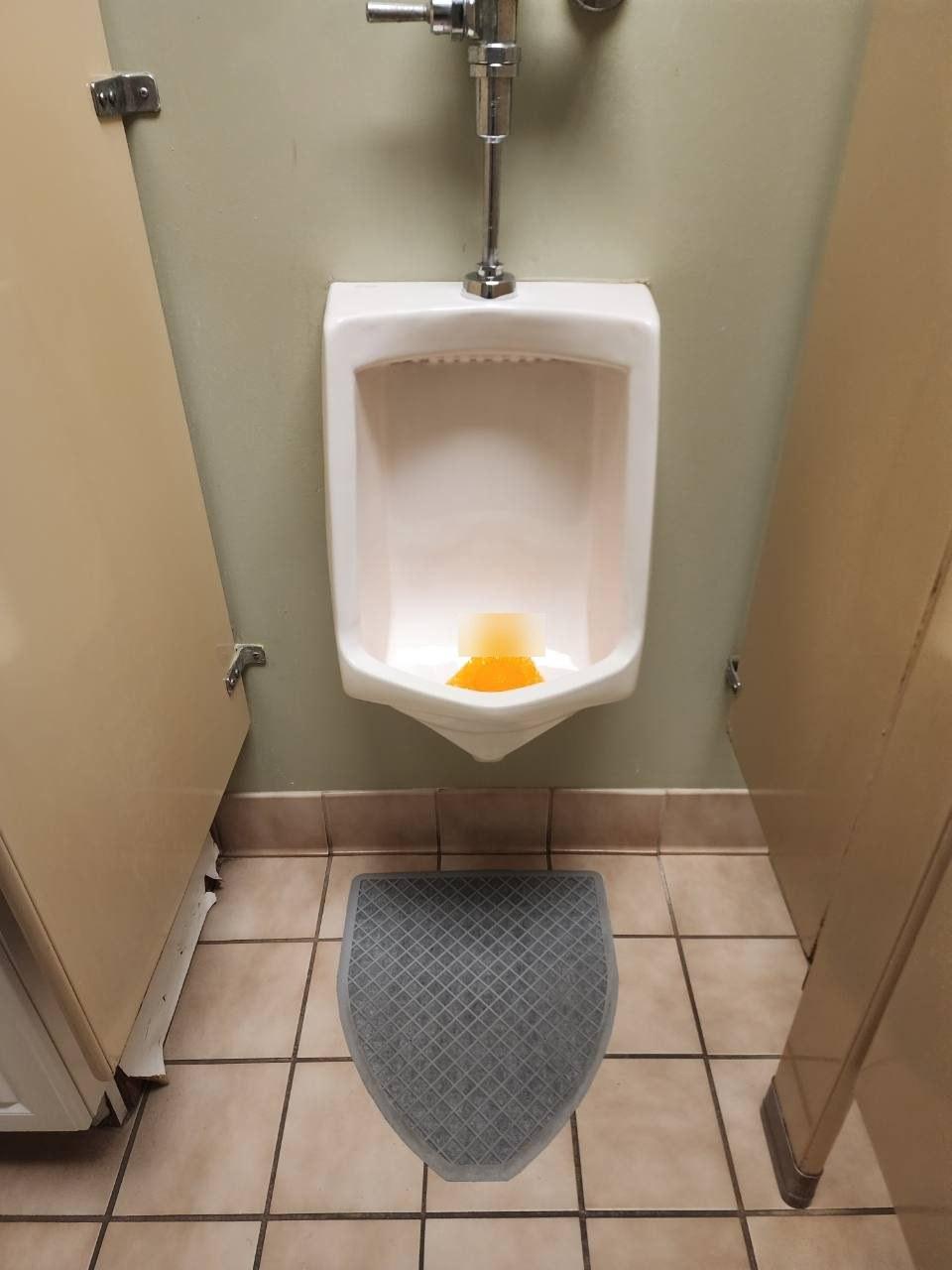 Restroom urinal after cleaning
