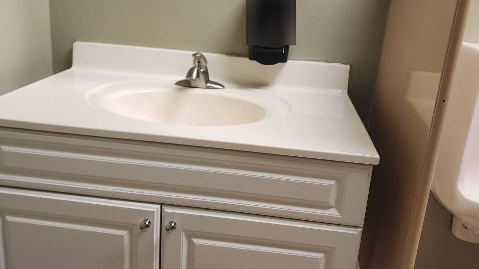 Restroom vanity and sink after a Chow visit