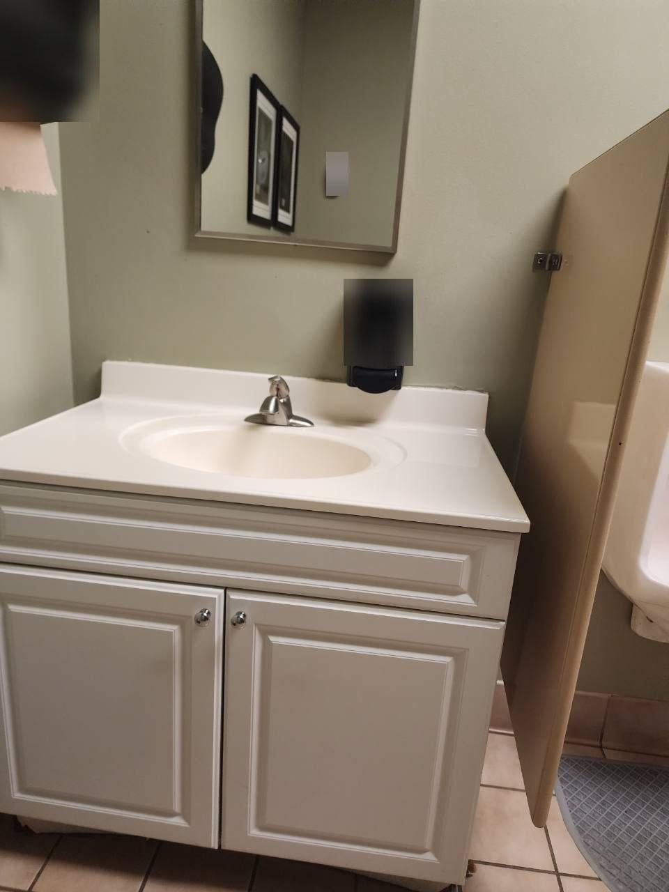Restroom vanity after cleaning and restocking