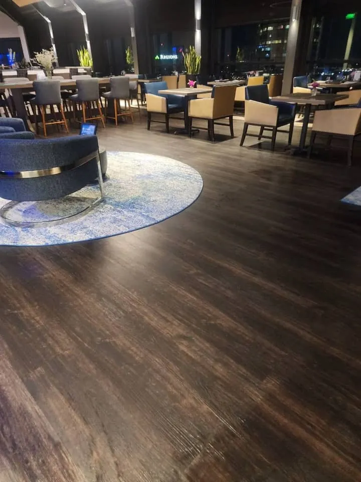 Lounge cleaning detail at a downtown Indianapolis client facility, documented in the Chow Connections service report