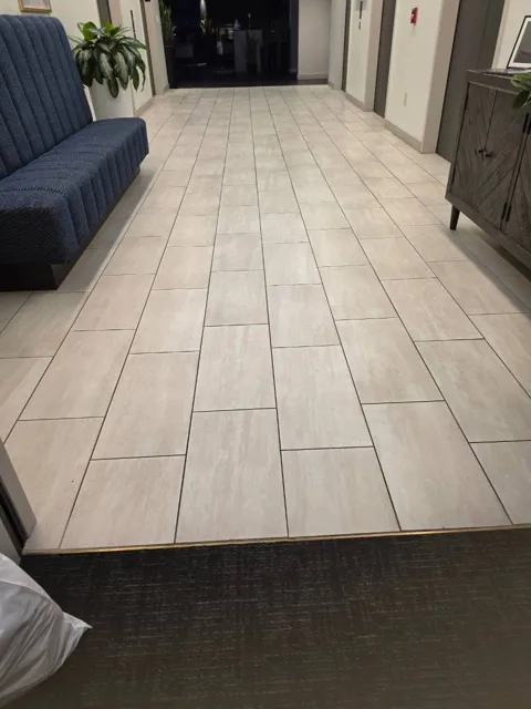 Lobby and elevator hallway in an Indianapolis commercial facility, before cleaning