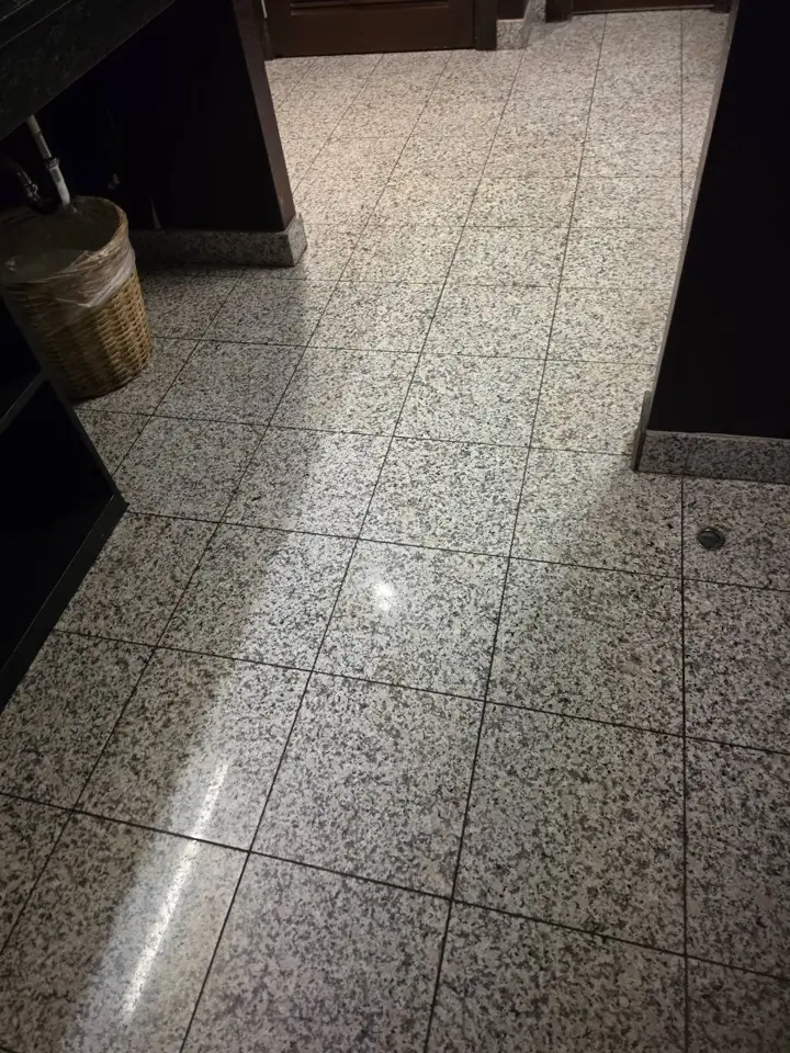 Freshly cleaned restroom tile floor after commercial cleaning in Indianapolis